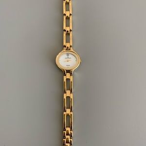 Anne Klein small gold watch.